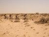 Simpson Desert Bike Challenge, 2007DAY 3 STAGE 5 and already the riders are bunched up helping each other battle the headwinds.  RIDERS 4, 19, 11 and 18.