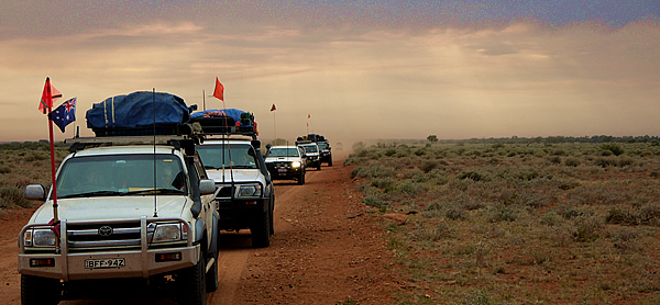 A surreal sky shadows the convoy after last night's lightning displays and resultant bushfires